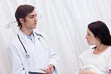 Patient getting examination results explained by doctor