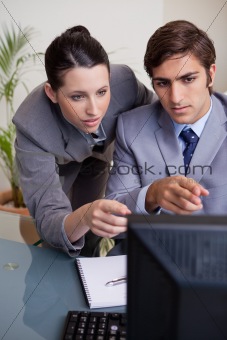Businesswoman helping her new colleague