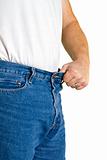 Man holds out waistline with pride