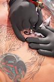 Tatto Artist Inks Tattoo