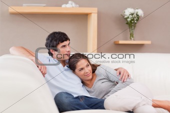 Couple being together on the couch