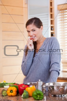 Woman in the kitchen with vegetables