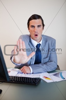 Businessman trying to calm down his negotiation partner