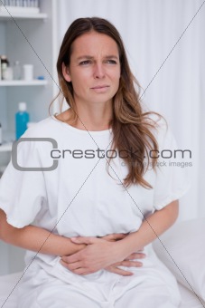 Woman having belly ache