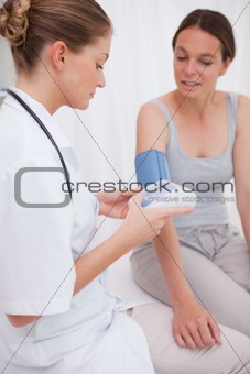 Doctor analyzing blood pressure