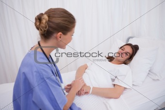 Surgeon visiting her patient