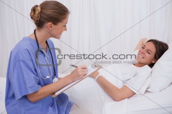 Surgeon talking with patient