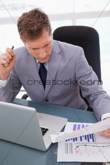 Businessman sitting at his desk