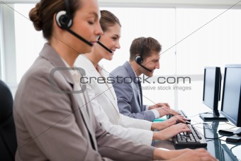 Side view of customer service employees