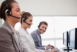 Side view of call center team