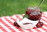 Jar of cherry jam