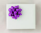 Purple star ribbon on White paper box