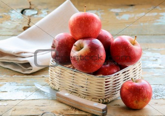 red ripe organic apples in the basket