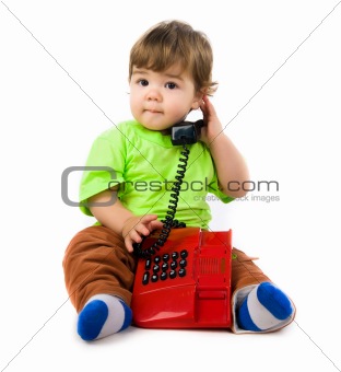 Little boy with the phon