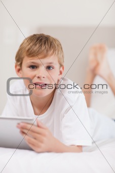 Portrait of a boy using a tablet computer
