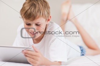Young boy using a tablet computer