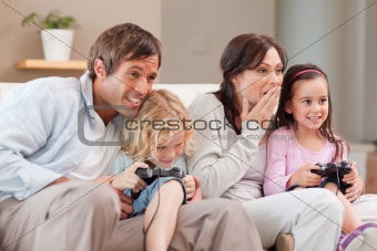 Competitive family playing video games