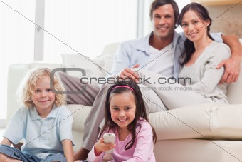 Lovely family watching television