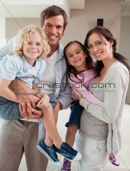 Portrait of a family posing together