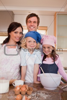 Portrait of a family baking together