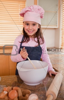 Portrait of a girl baking