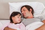 Father sleeping with his daughter