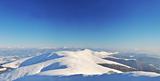 Snowy mountain ridges panoramic view