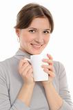 Young woman  having cup of tea 