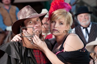 Rugged Cowboy and Bargirl Outdoors