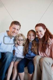 Cheerful family on the sofa