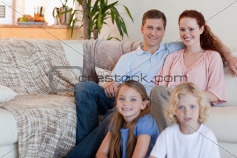 Family sitting in the living room