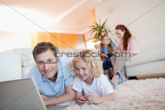 Father and son using the internet
