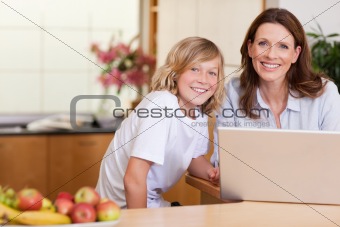 Woman with son on the laptop