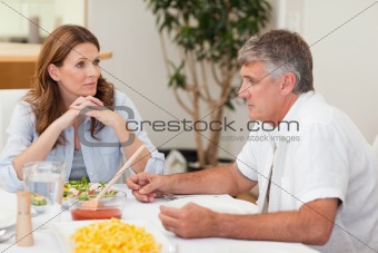 Family sitting at dinner table