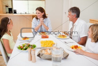 Family sitting at the dinner table