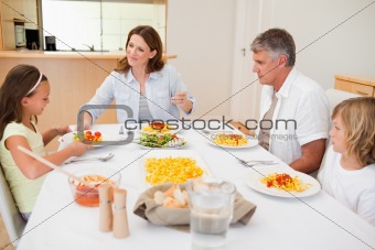 Family sitting for dinner
