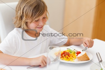 Boy eating dinner