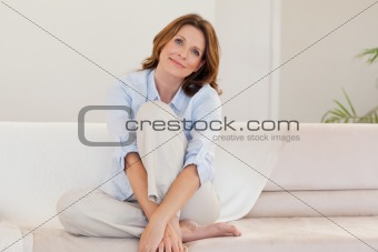 Mature woman on couch