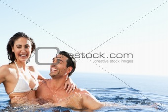 Couple enjoying time together in the pool
