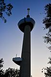 low angle view of the Euromast against the sunset sky