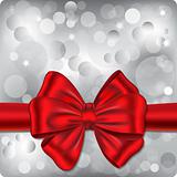 Bokeh background with red ribbon