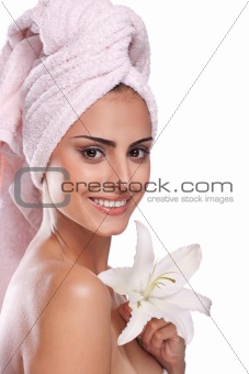 brunette spa woman in towel on head