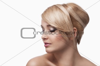 blond young girl with stylish, she's almost turned in profile