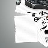Office table with stationery accessories, keyboard and empty pap