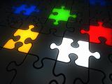 Glowing colorful jigsaw pieces