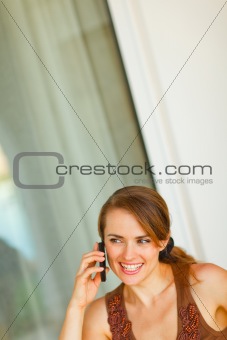 Portrait of beautiful woman speaking mobile phone
