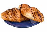 two croissants on blue dish