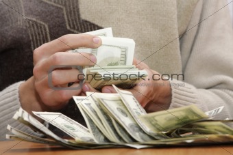 Cash dollars in hands