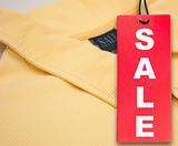 Sale Tag and Polo Shirt