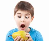 Child eating a pear